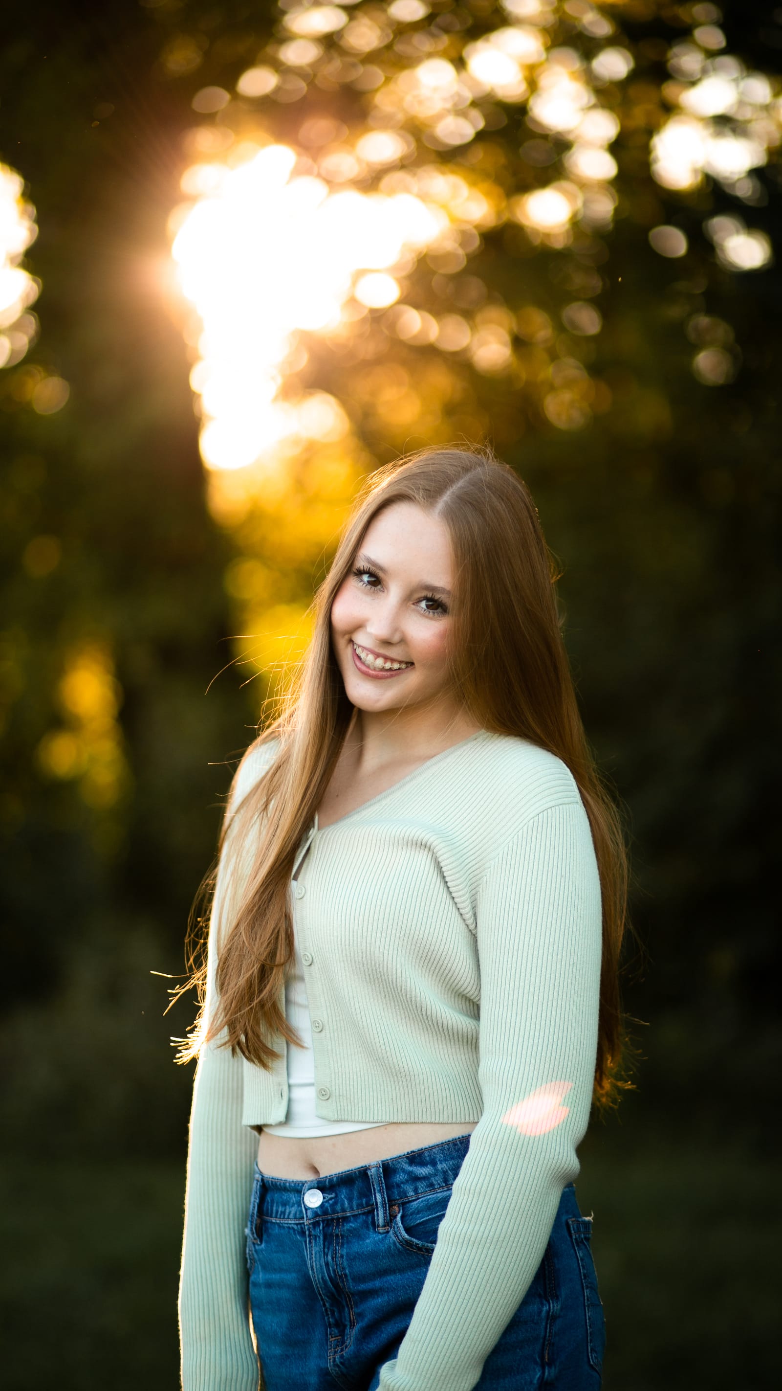 Portrait in golden hour among trees