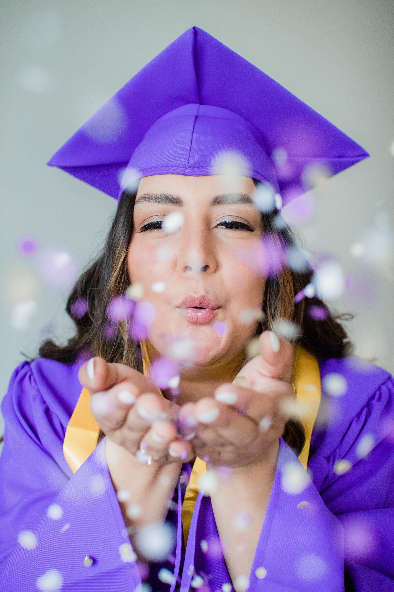 Graduation portrait with confetti